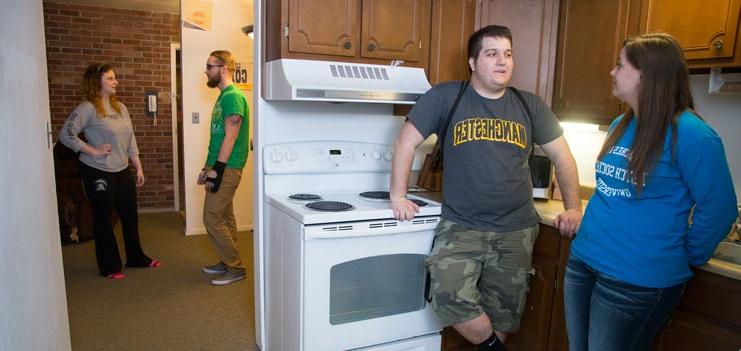 Students at a residence hall kitchen